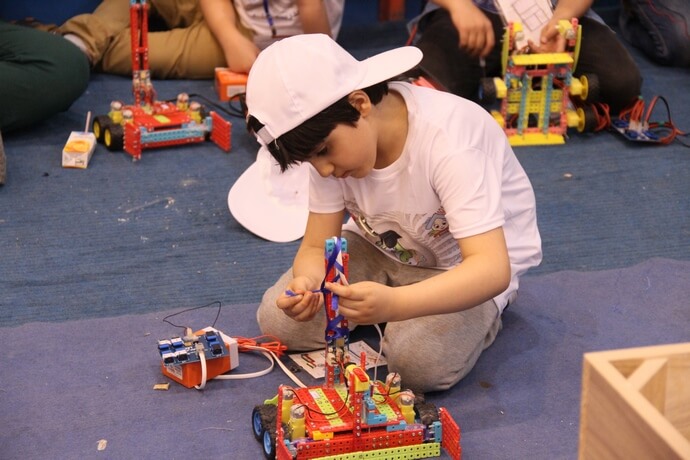 boy build a robot